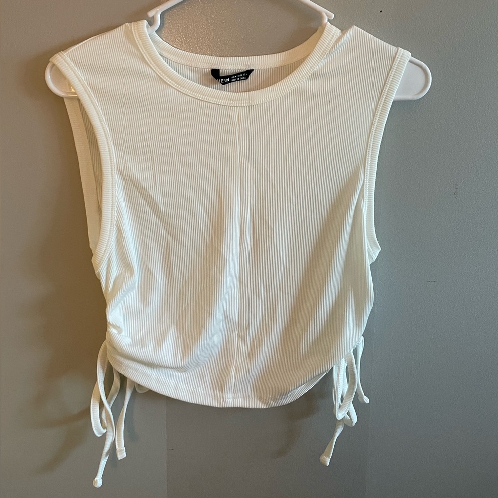 Shein White tank top with ties on both sides. Very lightweight and comfortable.